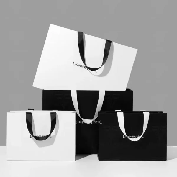 Gedrukte luxe papieren tas luxe cadeau papieren zakken OEM Logo handtas boodschappentas